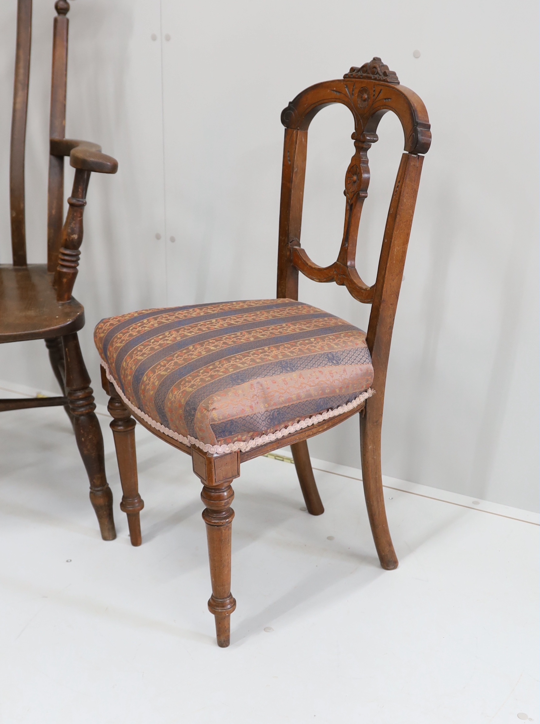 A Victorian elm and beech Windsor lathe back armchair, width 65cm, height 111cm, together with a Victorian walnut dining chair
